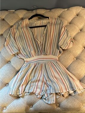 Urban Outfitters Cream Romper with Multicolor Stripes (Blue, Red, Yellow)